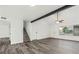 Spacious living room featuring wood-look floors and an abundance of natural light at 4046 Bridgeview Cir, Las Vegas, NV 89147