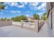 View of an open balcony with a decorative white railing, overlooking the surrounding neighborhood at 4108 Royal Scots Ave, Las Vegas, NV 89141