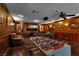 Basement featuring a foosball table and a TV area with comfortable seating, perfect for entertaining guests at 4108 Royal Scots Ave, Las Vegas, NV 89141
