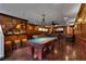 Entertainment basement with pool table, bar, and seating, perfect for hosting gatherings and relaxation at 4108 Royal Scots Ave, Las Vegas, NV 89141