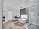 Elegant bathroom with a modern soaking tub and a glass enclosed shower at 4108 Royal Scots Ave, Las Vegas, NV 89141