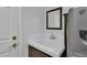 Compact and functional bathroom with clean lines and a built-in vanity, maximizing space and efficiency at 4108 Royal Scots Ave, Las Vegas, NV 89141