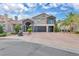 Stunning two-story home with a well-manicured yard, circular driveway, and a two-car garage at 4108 Royal Scots Ave, Las Vegas, NV 89141