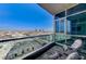 Relaxing balcony space offering expansive city and mountain views at 4525 Dean Martin Dr # 1208, Las Vegas, NV 89103