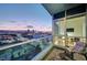 Relaxing balcony with comfortable seating and stunning city views at 4525 Dean Martin Dr # 1208, Las Vegas, NV 89103