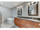 Luxurious bathroom featuring a soaking tub, dual sinks with modern fixtures, and a sleek design at 4525 Dean Martin Dr # 1208, Las Vegas, NV 89103