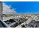 Expansive city view from balcony with lush landscaping at 4525 Dean Martin Dr # 1208, Las Vegas, NV 89103