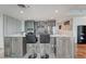 Kitchen island featuring barstool seating and countertops with stainless steel appliances at 4525 Dean Martin Dr # 1208, Las Vegas, NV 89103