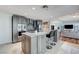 Modern kitchen island featuring barstool seating and modern appliances at 4525 Dean Martin Dr # 1208, Las Vegas, NV 89103