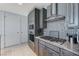Kitchen with stainless steel appliances, granite countertops, and modern backsplash at 4525 Dean Martin Dr # 1208, Las Vegas, NV 89103