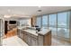 Open kitchen with granite countertops, stainless appliances, and views at 4525 Dean Martin Dr # 1208, Las Vegas, NV 89103