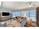 Cozy living room showcasing floor-to-ceiling windows and comfortable seating at 4525 Dean Martin Dr # 1208, Las Vegas, NV 89103