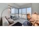 Bright living room featuring floor-to-ceiling windows with city views, and modern furnishings at 4525 Dean Martin Dr # 1208, Las Vegas, NV 89103