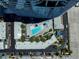 Aerial view showcasing pool, amenities, lush landscaping, and proximity to the main building at 4575 Dean Martin Dr # 304, Las Vegas, NV 89103