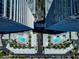 Stunning aerial view of community pools and buildings in a condominium complex with lush landscaping and modern design at 4575 Dean Martin Dr # 304, Las Vegas, NV 89103