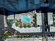 Aerial view showcases the pool, modern residences and palm trees, perfect for relaxation at 4575 Dean Martin Dr # 304, Las Vegas, NV 89103