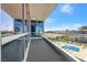 Relax on this private balcony with views of the pool and city skyline from this modern condo at 4575 Dean Martin Dr # 304, Las Vegas, NV 89103