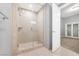This bathroom features a tiled glass-enclosed shower and neutral wall paint at 4575 Dean Martin Dr # 304, Las Vegas, NV 89103