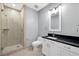 This bathroom features a glass shower and a vanity with light-colored cabinets at 4575 Dean Martin Dr # 304, Las Vegas, NV 89103