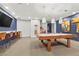 Entertain in the game room, featuring a pool table, TV, and seating for residents and guests at 4575 Dean Martin Dr # 304, Las Vegas, NV 89103