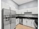 Bright kitchen features stainless steel appliances, white cabinetry, and dark countertops at 4575 Dean Martin Dr # 304, Las Vegas, NV 89103