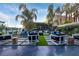 Modern outdoor lounge area with cozy seating, a fire pit, and lush green accents at 4575 Dean Martin Dr # 304, Las Vegas, NV 89103