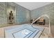 Lovely spa with tiled hot tub and a statue at 4575 Dean Martin Dr # 304, Las Vegas, NV 89103