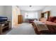 Spacious bedroom with natural light, a lounge, and a dresser at 4719 Sparta Way, North Las Vegas, NV 89032