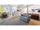 Open-concept living room and dining area with a smooth transition into the kitchen space at 4719 Sparta Way, North Las Vegas, NV 89032