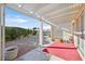 Covered patio with view to backyard; includes shade cover, gravel landscaping and pavers at 5429 Sweet Shade St, Las Vegas, NV 89130