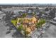 An aerial view highlights a home's serene backyard with mature trees, a gazebo, and desert landscaping features at 5829 W Patrick Ln, Las Vegas, NV 89118