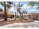 Charming backyard featuring a gazebo, patio, and meticulously maintained desert landscaping, enhancing the curb appeal at 5829 W Patrick Ln, Las Vegas, NV 89118