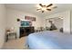 This bedroom has a mirrored closet and dresser with TV at 5829 W Patrick Ln, Las Vegas, NV 89118