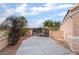 Gated driveway leading to a single-story home, ensuring privacy and security at 5829 W Patrick Ln, Las Vegas, NV 89118