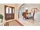Elegant foyer with marble floors, arched entryway, and decorative chandelier at 5829 W Patrick Ln, Las Vegas, NV 89118