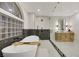 Bright bathroom featuring freestanding tub, glass shower, and wood vanity with black hardware at 62 Incline Village Ct, Henderson, NV 89074