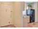 Galley kitchen featuring granite countertops and black appliances at 6480 Annie Oakley Dr # 624, Las Vegas, NV 89120