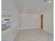 Bright open-concept living room featuring tile flooring, and recessed lighting at 681 Stone Hammer Ave, Las Vegas, NV 89183