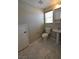 A well-lit bathroom with a pedestal sink at 7089 Oberling Bay Ave, Las Vegas, NV 89113