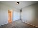 Neutral bedroom featuring carpet, recessed lighting, and a closet with a bathroom just outside the door at 7089 Oberling Bay Ave, Las Vegas, NV 89113