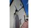 Exterior corner home view showcasing stucco wall and satellite dish at 7089 Oberling Bay Ave, Las Vegas, NV 89113