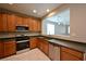 Well-equipped kitchen featuring stainless steel appliances and an open layout at 7089 Oberling Bay Ave, Las Vegas, NV 89113