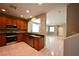 Kitchen with modern appliances opens to living space at 7089 Oberling Bay Ave, Las Vegas, NV 89113