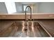 A stainless steel kitchen sink with a modern faucet at 7089 Oberling Bay Ave, Las Vegas, NV 89113