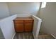 Second floor landing area with storage cabinet, near stairway at 7089 Oberling Bay Ave, Las Vegas, NV 89113