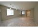 Expansive living area showcasing large windows and sleek tiled floors for contemporary living at 7089 Oberling Bay Ave, Las Vegas, NV 89113