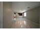 Spacious living room with stylish tiled flooring and abundant natural light at 7089 Oberling Bay Ave, Las Vegas, NV 89113