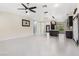 Open-concept living space featuring recessed lighting, stylish fixtures and seamless flow to the kitchen at 8021 Yellow Daisy Ave, Las Vegas, NV 89147