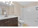 Well-maintained bathroom featuring a single sink vanity, toilet, and tiled shower-tub combination at 8409 Running Deer Ave # 203, Las Vegas, NV 89145