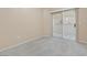 Well-lit carpeted bedroom featuring a sliding glass door leading to outdoor space with neutral walls at 8409 Running Deer Ave # 203, Las Vegas, NV 89145